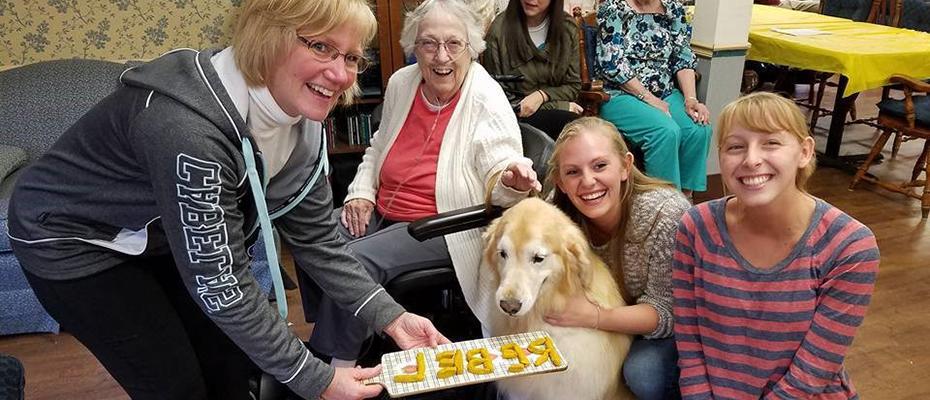 Student volunteers at an assisted living facility